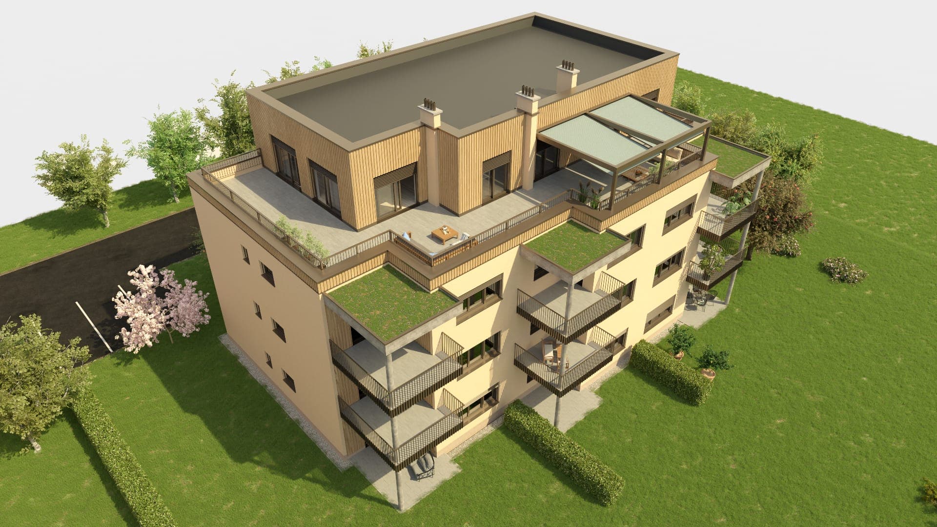 Außenansicht eines Mehrfamilienhauses mit Holz-Penthouse, begrünten Balkonen und Rasenfläche.